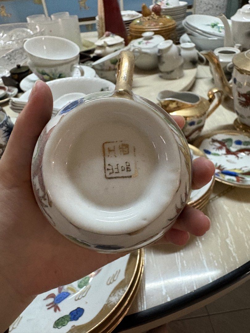 Dragon patterned tea set (Category: Coffee & Tea Tableware) located in Singapore. Submitted by chercher02 (Listing ID 1459964660, Image 2). Description: Set includes: - tea pot - creamer jug - sugar pot - x6 tea cups - x6 saucers .