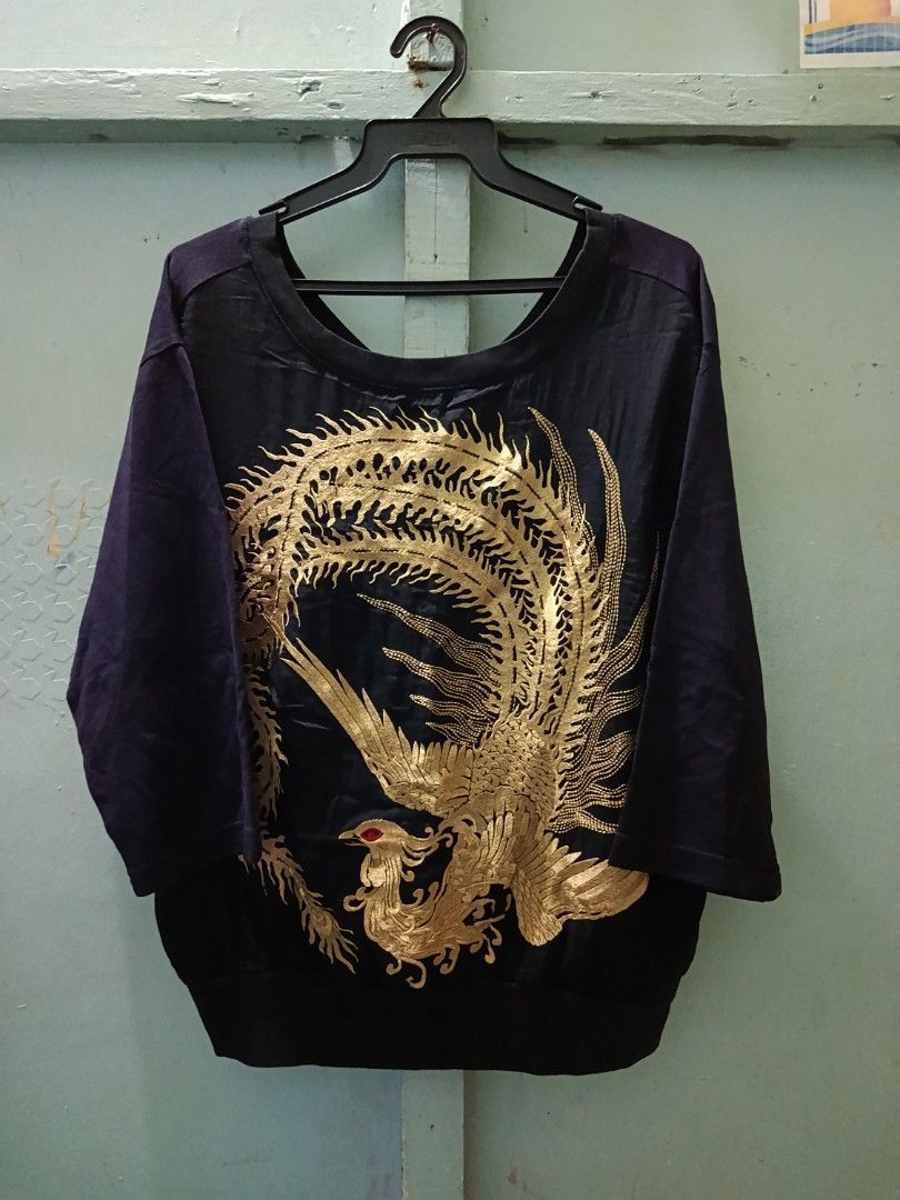 DREIS VAN NOTEN (Category: Luxury Apparel) located in Mandaluyong City. Submitted by newdepot (Listing ID 1460033583, Image 1). Description: - Dries Van Noten black 3/4 shirt - Features a gold phoenix embroidery on the back - Size: S - Dimes 21x24. shoulder 14.5 - Made in India - Material: 100% cotton.