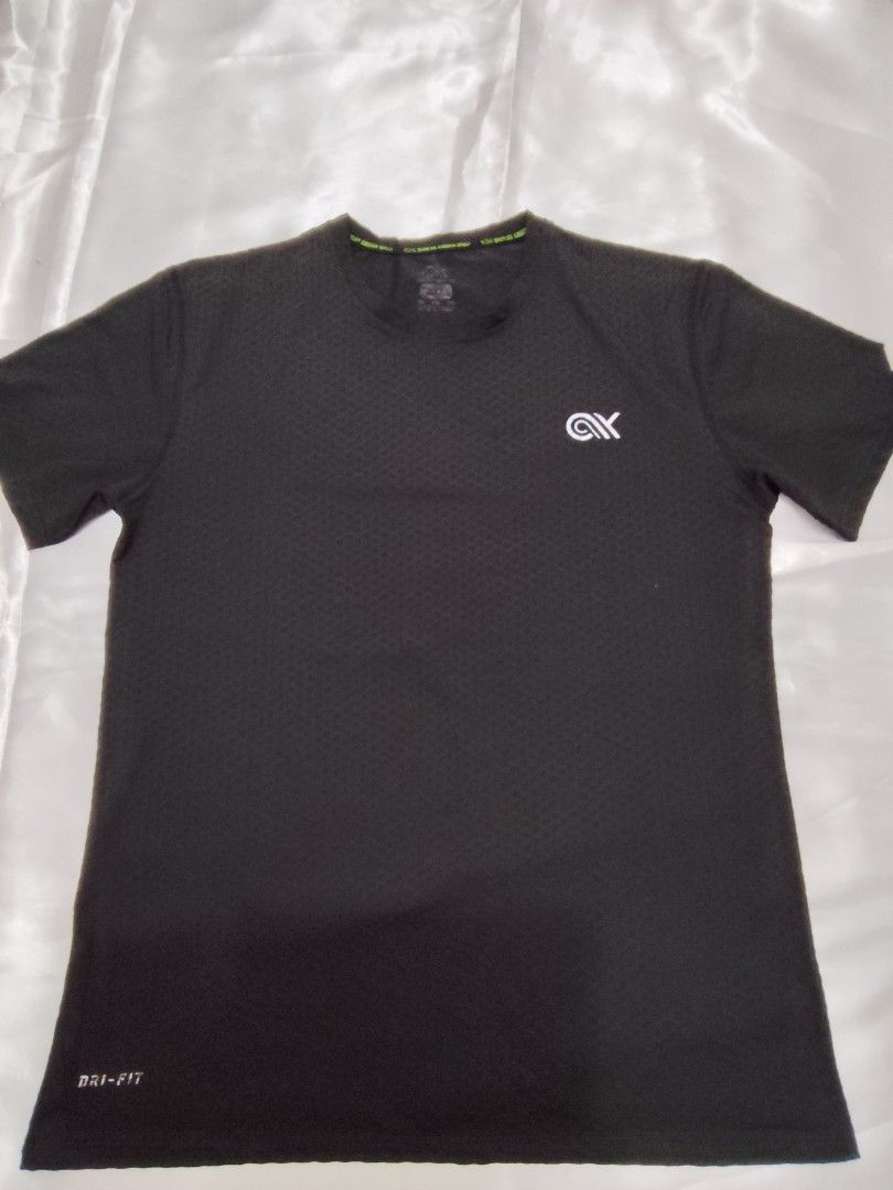 Dri-FIT Athletic T-Shirt (Category: Tshirts & Polo Shirts ) located in Quezon City. Submitted by its.leen (Listing ID 1460085456, Image 1). Description: - Available in Black and Navy Blue - Dri-FIT technology for sweat-wicking - Small logo on the chest - Reflective strip on the back for visibility - Comfortable and breathable fabric - Ideal for workouts and casual wear -200 each or 2pcs for 350.