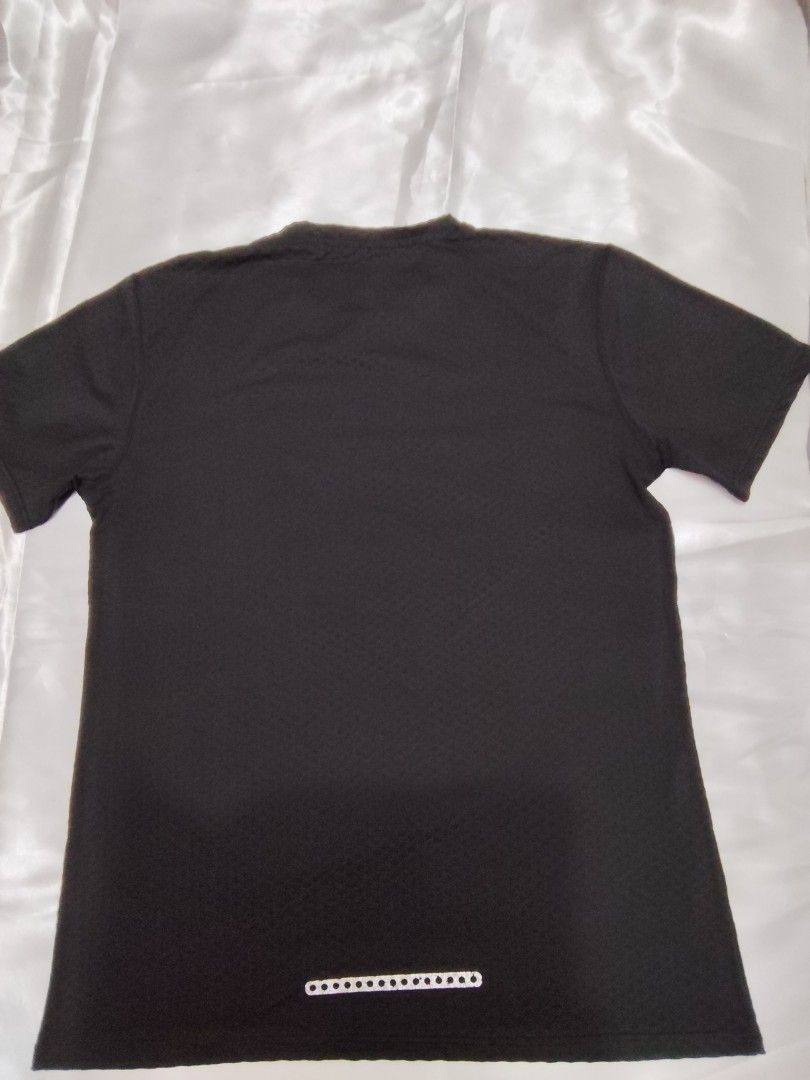 Dri-FIT Athletic T-Shirt (Category: Tshirts & Polo Shirts ) located in Quezon City. Submitted by its.leen (Listing ID 1460085456, Image 2). Description: - Available in Black and Navy Blue - Dri-FIT technology for sweat-wicking - Small logo on the chest - Reflective strip on the back for visibility - Comfortable and breathable fabric - Ideal for workouts and casual wear -200 each or 2pcs for 350.