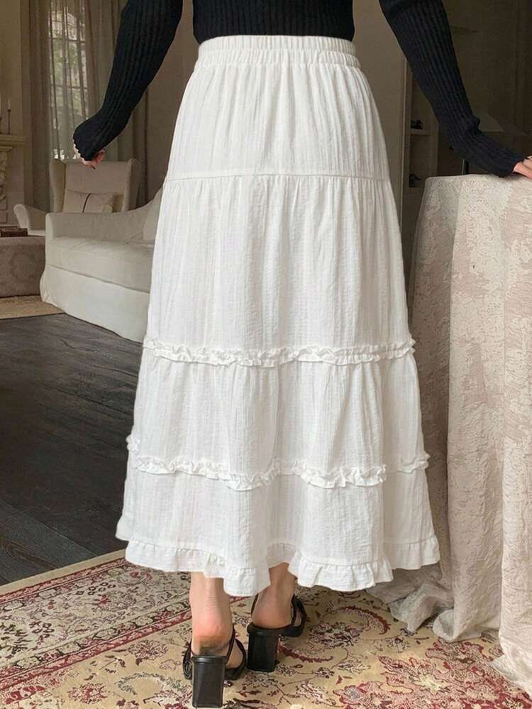 Earthy Garterized tiered texture long skirt (Category: Skirts) located in Cordova. Submitted by thedecluterrer (Listing ID 1459996216, Image 2). Description: LENGTH 35” WAIST 26-34.