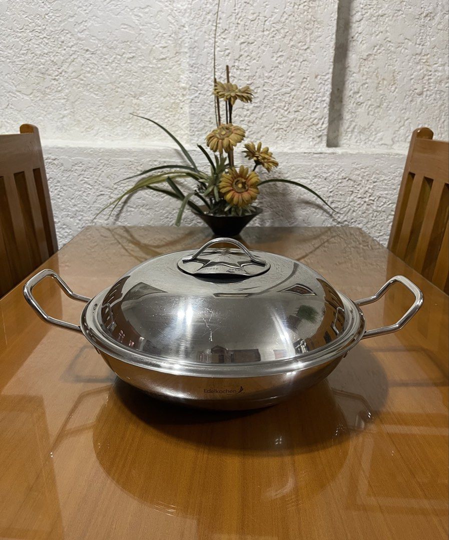 Edelkochen Stainless Steel Wok 28cm (Category: Cookware & Accessories) located in Quezon City. Submitted by doublelkitchenware (Listing ID 1460021553, Image 1). Description: Edelkochen Stainless Steel Wok with original cover Made in Korea 28x7.5cm Induction / Gas / Electric Solid, Makapal and mabigat Fully clad Minimal sign of usage Pick up or shipping via lalamove Provincial 🚚j&t Novaliches Qc .