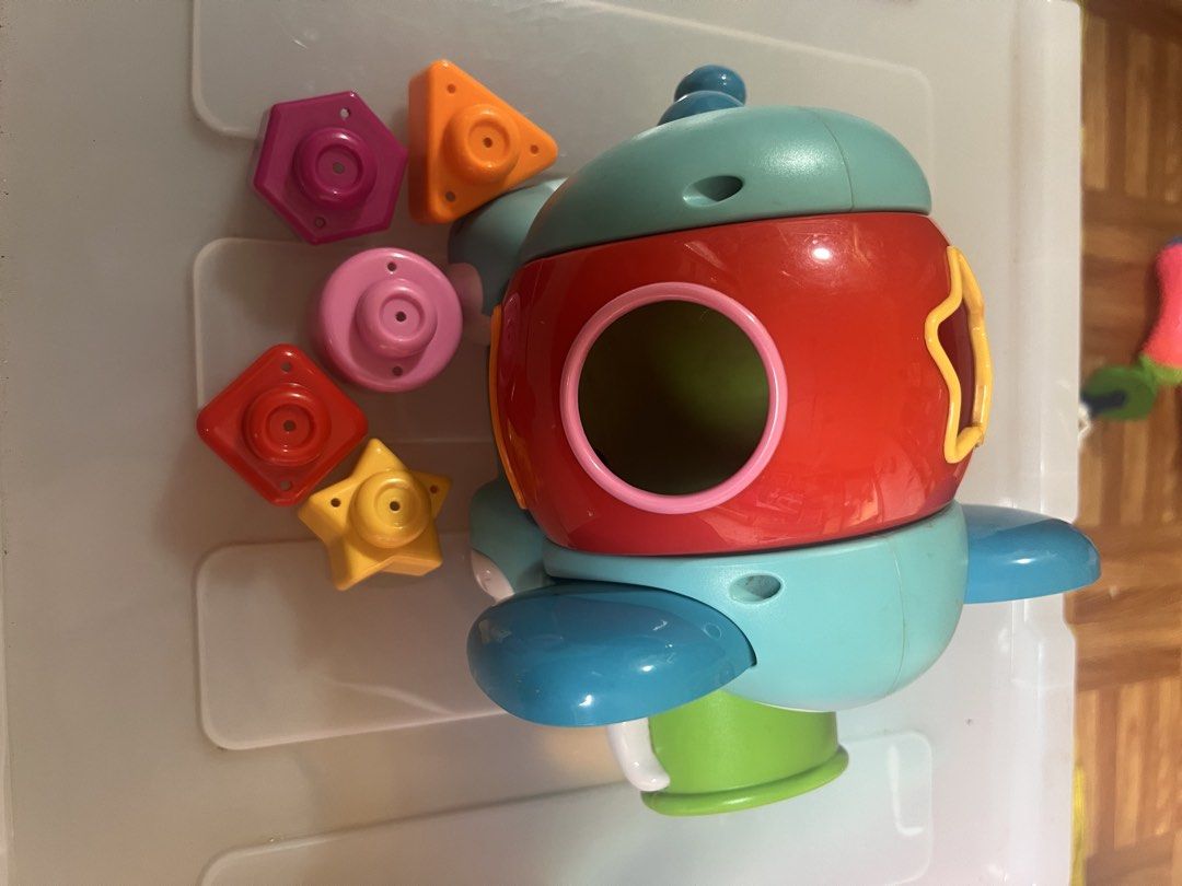 Elephant Shape Sorter Toy with Multiple Shapes (Category: Educational & Learning Toys) located in Taguig. Submitted by amorzy (Listing ID 1460025259, Image 2). Description: - Adorable elephant shape sorter toy. - Includes colorful shapes: stars, hexagons, and squares. - Features a trunk for shape sorting. - Perfect for teaching toddlers shapes and colors. - Shows minor scuffs from normal use. Location: Upper Bicutan.