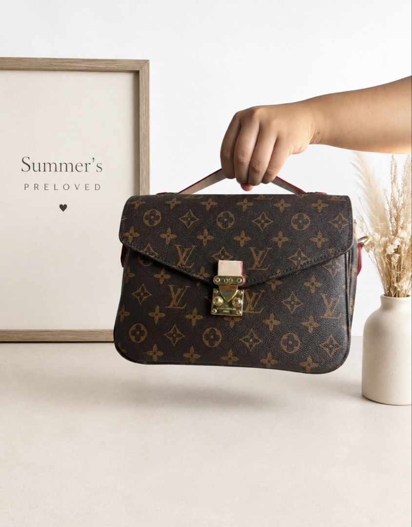 Elvira Metis (Category: Luxury Bags & Wallets) located in Taguig. Submitted by summers.preloved (Listing ID 1459996178, Image 3). Description: BAG DETAILS Model: Louis Vuitton Pochette Métis Material: Monogram coated canvas with leather trim Color: Classic brown Monogram with contrasting red-edged leather accents Hardware: Gold-tone Closure: Signature S-lock front closure Handle: Single top handle Strap: Detachable and adjustable Monogram shoulde