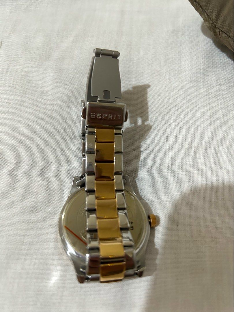 Esprit Two-Tone Stainless Steel Watch with Box (Category: Women's Watches) located in Cavite. Submitted by mommyannscloset (Listing ID 1459991205, Image 3). Description: - Esprit watch - Silver and gold tone bracelet - White dial with rose gold accents - Date and day sub-dials - Includes original box - Extra links included - Ideal for everyday wear.