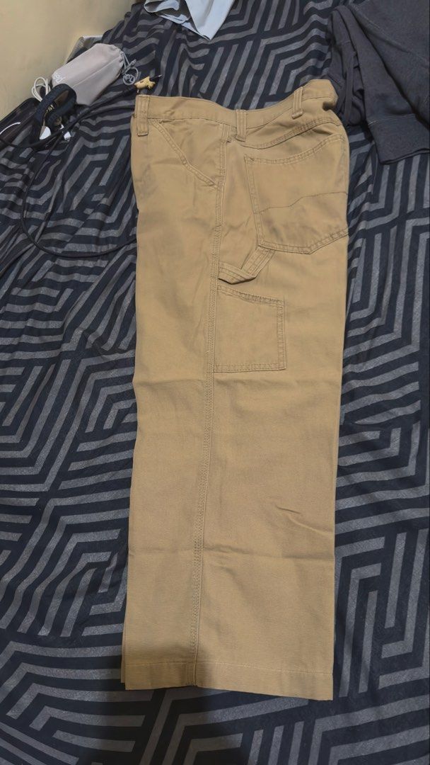 Faded glory Khaki Carpenter Pants (Category: Jeans) located in Plaridel. Submitted by estanislao.noveno (Listing ID 1459910814, Image 1). Description: - Classic khaki carpenter pants size 34 - Durable fabric for long-lasting wear - Multiple pockets for convenient storage - Comfortable fit for everyday use - Ideal for work or casual outfits.