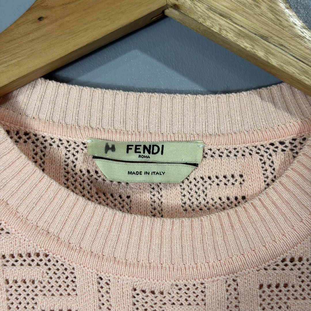 FENDI (Category: Blouses) located in Mangaldan. Submitted by restyletrends.ph (Listing ID 1460064308, Image 3). Description: Fendi Motif Knitted Top Size : Medium to Large Length : 21.5 Width : 19 Color rate : 10/10 Like new No issue.