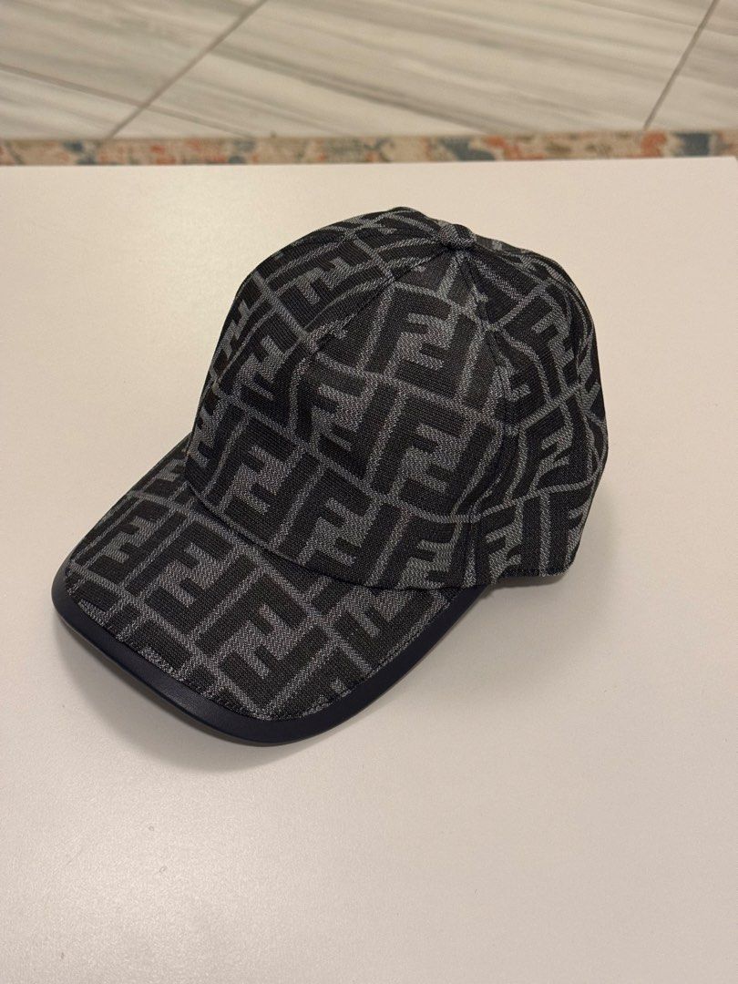 Fendi FF Monogram Baseball Cap (Category: Caps & Hats) located in Manila. Submitted by wockesha (Listing ID 1459979188, Image 1). Description: Fendi Blue Ff Jacquard baseball hat Size Medium (58cm) Excellent Condition Hat only 6,000.