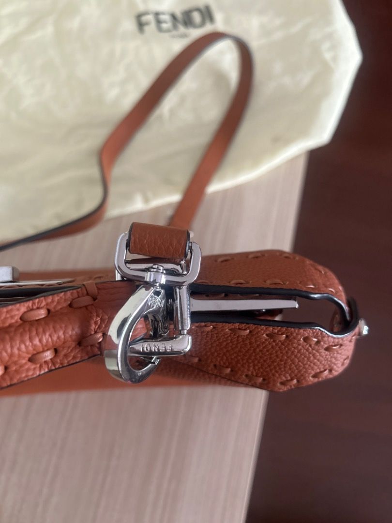 Fendi Peekaboo Bag (Category: Luxury Bags & Wallets) located in Cebu City. Submitted by serene_simplicity (Listing ID 1459966872, Image 3). Description: -“OG quality” Fendi Peekaboo Bag - Color: Tan Leather - Features: Decorative stitching, top handle, shoulder strap - Hardware: Silver - Includes: Dust bag - Versatile: Suitable for everyday or special occasions.