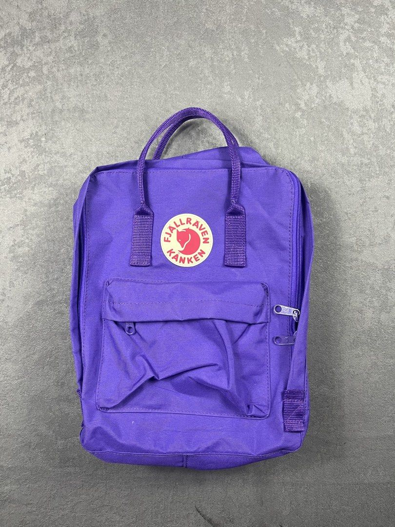 Fjallraven Kanken Mini Backpack Purple (Category: Backpacks) located in Manila. Submitted by homegrwn_thrift (Listing ID 1460005999, Image 1). Description: - Authentic purple Fjallraven Kanken Mini backpack - Made from durable and water-resistant Vinylon F fabric - Classic Kanken design with a spacious main compartment and front zippered pocket - Adjustable shoulder straps for a comfortable fit - Ideal for everyday use, school, or short trips - C