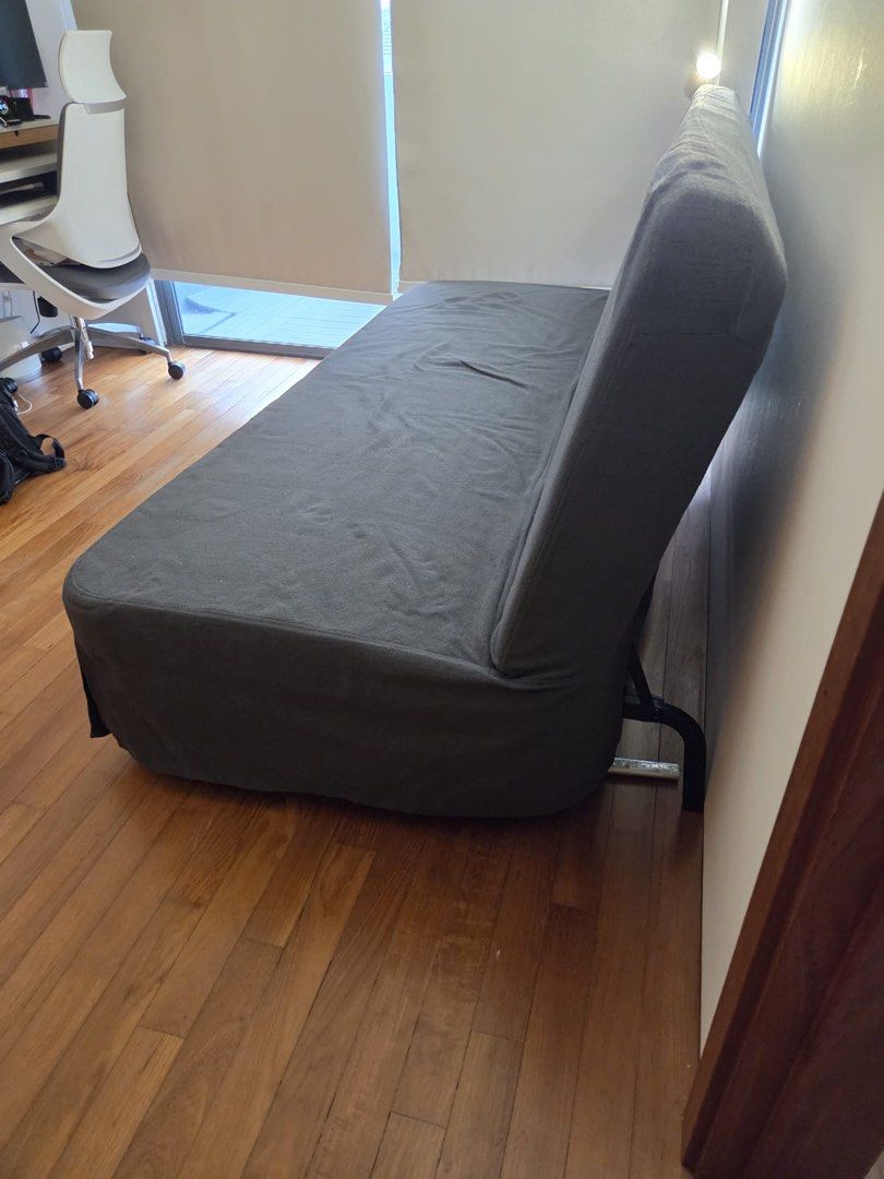 Foldable bed (Category: Sofas) located in Singapore. Submitted by goldenellipse (Listing ID 1459923964, Image 3). Description: Width 202 cm Depth 107 cm Height 97 cm Bed opened 145 by 202.