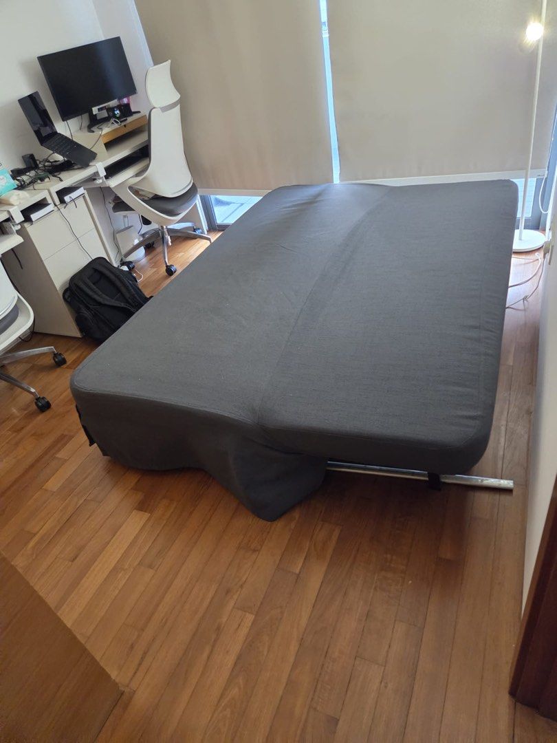 Foldable bed (Category: Sofas) located in Singapore. Submitted by goldenellipse (Listing ID 1459923964, Image 2). Description: Width 202 cm Depth 107 cm Height 97 cm Bed opened 145 by 202.