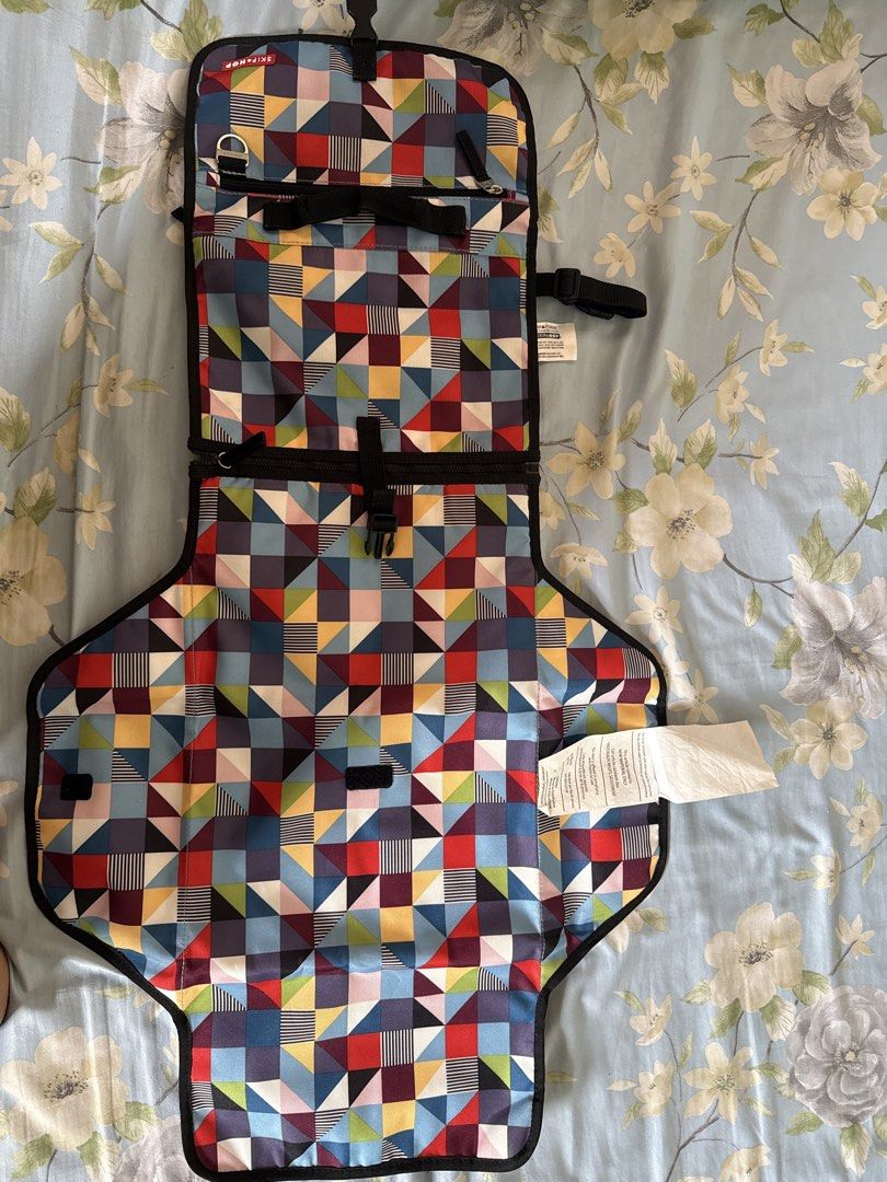 Foldable diaper changing pad (Category: Changing Mats & Accessories) located in Quezon City. Submitted by leah_decluttering (Listing ID 1459922464, Image 2). Description: Foldable diaper changing mat With storage pockets Waterproof Rfs: declutterring Shipping thru grab/lalamove.