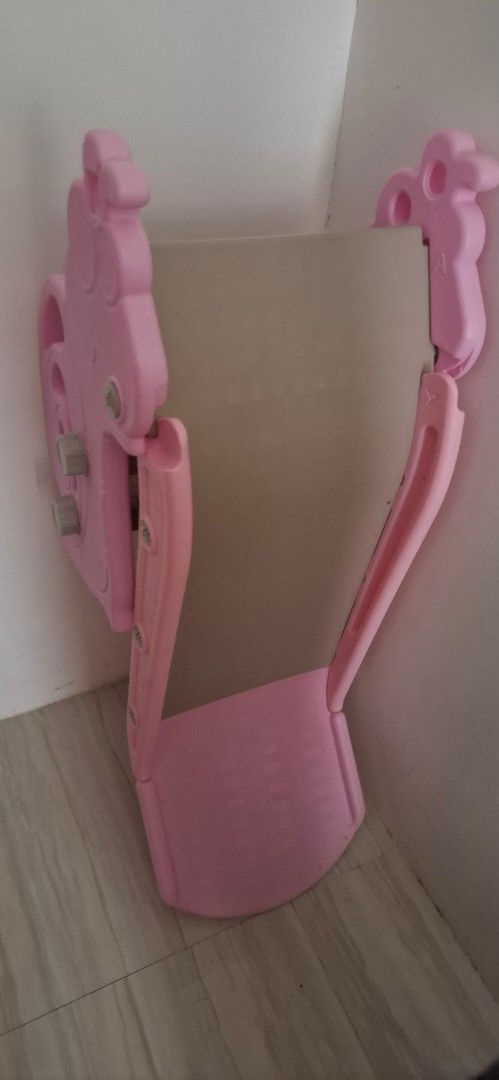 Foldable kids slide (Category: Infant Playtime) located in Bacoor. Submitted by well_loved_stuffs (Listing ID 1459988735, Image 1). Description: pink slide small size like new foldable good for 1-2yrs old since mababa lang .