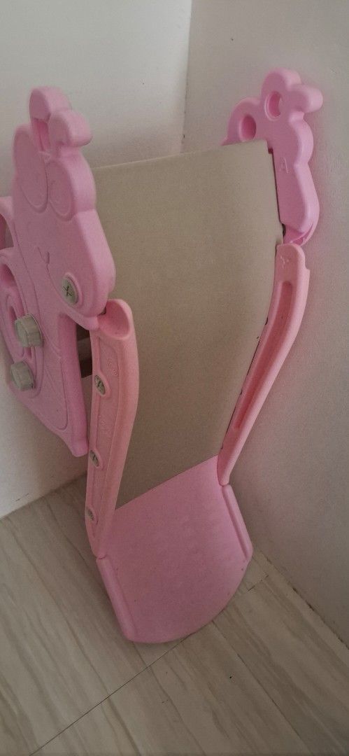 Foldable kids slide (Category: Infant Playtime) located in Bacoor. Submitted by well_loved_stuffs (Listing ID 1459988735, Image 2). Description: pink slide small size like new foldable good for 1-2yrs old since mababa lang .