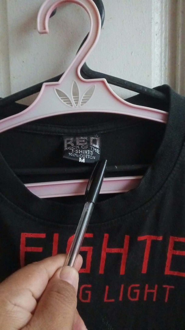 Foo Fighters Wasting Light T-Shirt Size M (Category: Tshirts & Polo Shirts ) located in Quezon City. Submitted by wheelsonmeals (Listing ID 1459926024, Image 3). Description: - Black t-shirt featuring Foo Fighters Wasting Light album art - Graphic includes band members' faces - Made from 100% cotton - Tagged as size M - Ideal for any Foo Fighters enthusiast.
