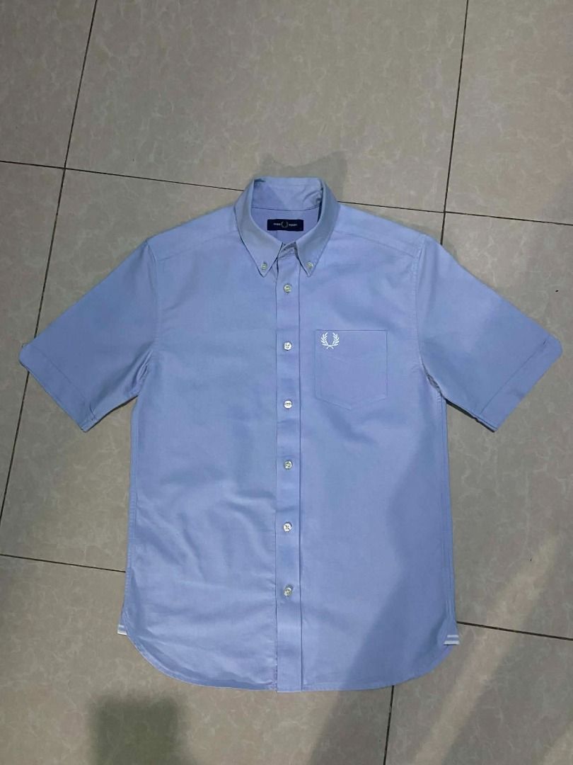 Fred Perry Short Sleeve Oxford Shirt Light Blue (Category: Tshirts & Polo Shirts ) located in Caloocan City. Submitted by newmetho (Listing ID 1459999621, Image 1). Description: 20x28.