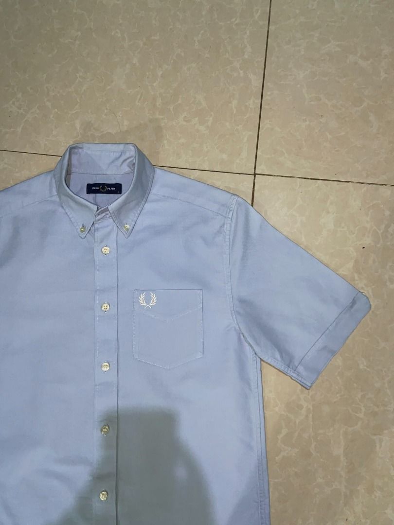 Fred Perry Short Sleeve Oxford Shirt Light Blue (Category: Tshirts & Polo Shirts ) located in Caloocan City. Submitted by newmetho (Listing ID 1459999621, Image 2). Description: 20x28.