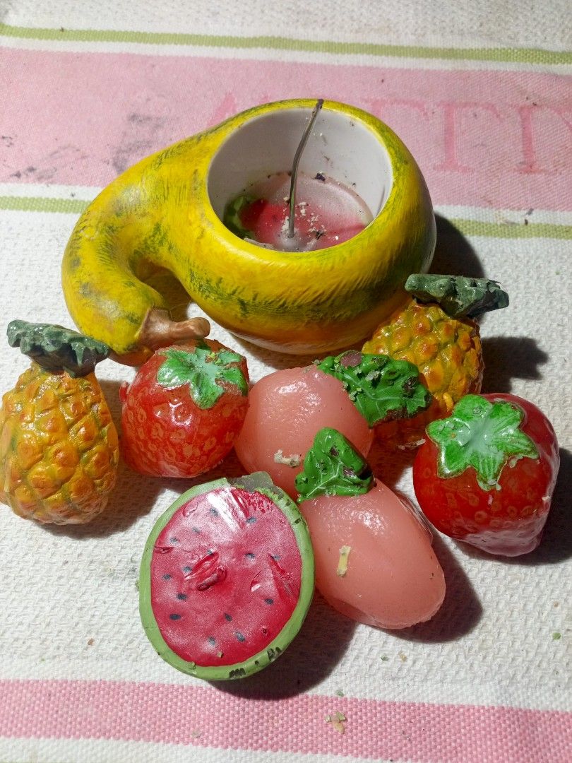Fruit Shaped Candle Holder with Decorative Candles (Category: Other Home Decor) located in Marikina City. Submitted by norman213 (Listing ID 1459907199, Image 2). Description: - Adorable yellow pear-shaped candle holder. - Hollow top designed to hold a candle. - Includes decorative fruit-themed candles: strawberries, pineapples, watermelon, and cherries. - Adds a fun and whimsical accent to any room. - Ideal for parties, celebrations, or as a uni