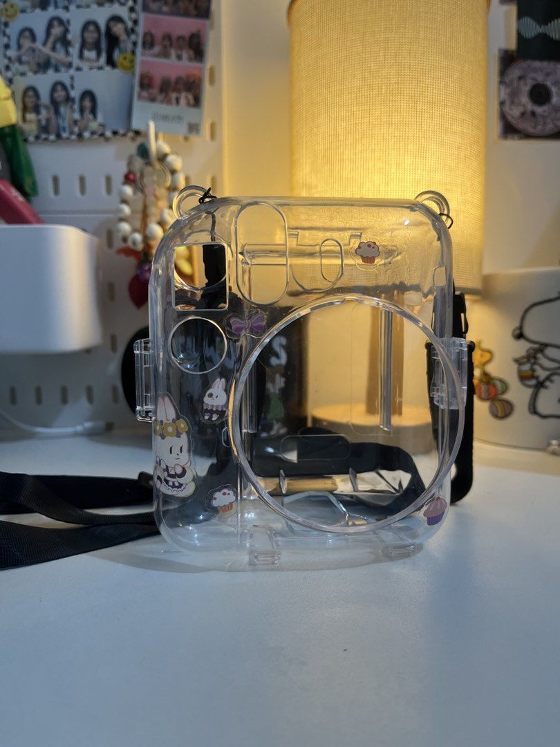 Fujifilm Instax Mini 12 Clear Case + Strap (Category: Cameras) located in Orani. Submitted by diomahalkitasevenyrsna (Listing ID 1460029441, Image 2). Description: Selling as is, case +strap Brand new, never been used since I don’t have Instax Mini 12 rfs: Ordered a wrong case Sf will be shouldered by the buyer No cod to avoid bogus buyers mop: gcash/cash.