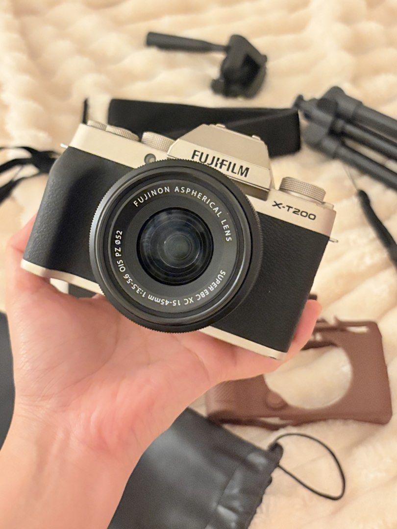 Fujifilm XT200 (Category: Cameras) located in Magalang. Submitted by yelulur (Listing ID 1460077851, Image 2). Description: FOR SALE: Fujifilm X-T200 in good condition inclusions: tripod camera strap camera pouch cord charger battery fujinon lens extra screen protector silicon case 📍Magalang.
