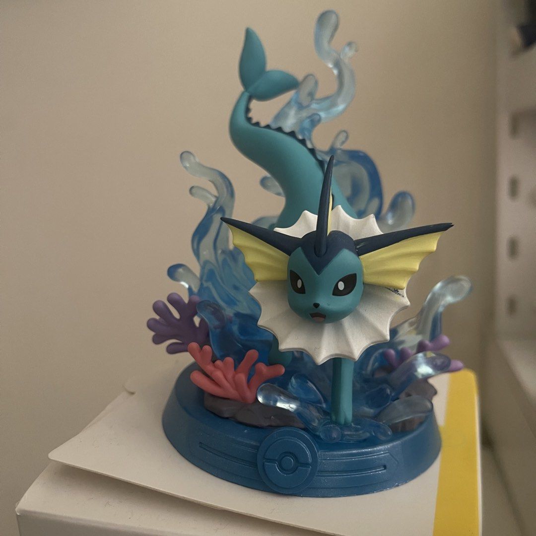 Funism Pokemon Adventure Eevee Series (Category: Figurines & Statues) located in Bacolor. Submitted by fushi6uro (Listing ID 1459924576, Image 1). Description: Selling an official, licensed Funism Pokémon Vaporeon collectible figure featuring dynamic water splash effects and a detailed coral reef base! Brand: Funism (100% Officially Licensed Pokémon Product) Condition: Pre-loved / Displayed only. Excellent, crisp condition with clean paint detail