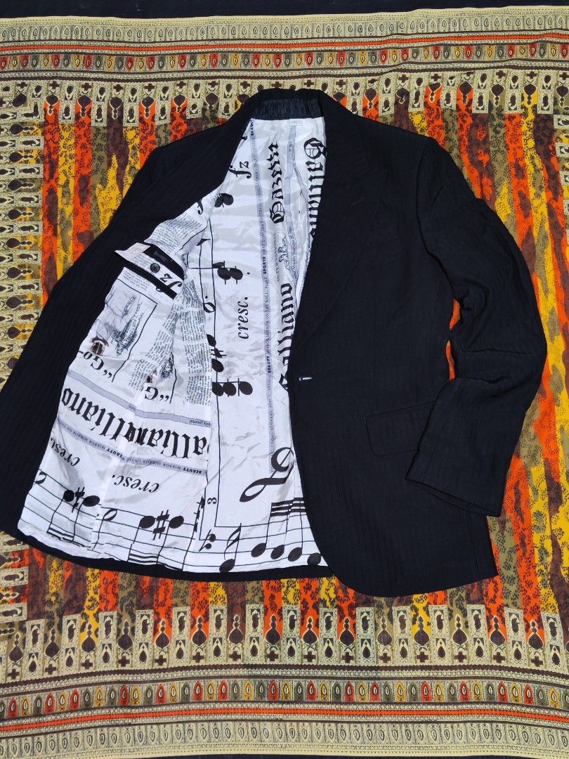 Galliano Gazette Single Breasted Blazer (Category: Luxury Apparel) located in Baguio. Submitted by damit_pang_tao (Listing ID 1460094647, Image 2). Description: Galliano Gazette Single Breasted Blazer Size on tag: 48 Dimensions: Length:30 in Pit to pit: 20 in Sleeve: 25 in Waist: 18 in Shoulder to shoulder: 19 in Condition: excellent 9/10 Issue: Main Rubberized tag Removed Mine: Php 1580+sf Disclaimer: Damit Pang Tao is not affiliated or connecte