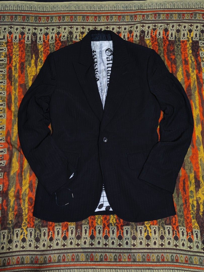 Galliano Gazette Single Breasted Blazer (Category: Luxury Apparel) located in Baguio. Submitted by damit_pang_tao (Listing ID 1460094647, Image 1). Description: Galliano Gazette Single Breasted Blazer Size on tag: 48 Dimensions: Length:30 in Pit to pit: 20 in Sleeve: 25 in Waist: 18 in Shoulder to shoulder: 19 in Condition: excellent 9/10 Issue: Main Rubberized tag Removed Mine: Php 1580+sf Disclaimer: Damit Pang Tao is not affiliated or connecte