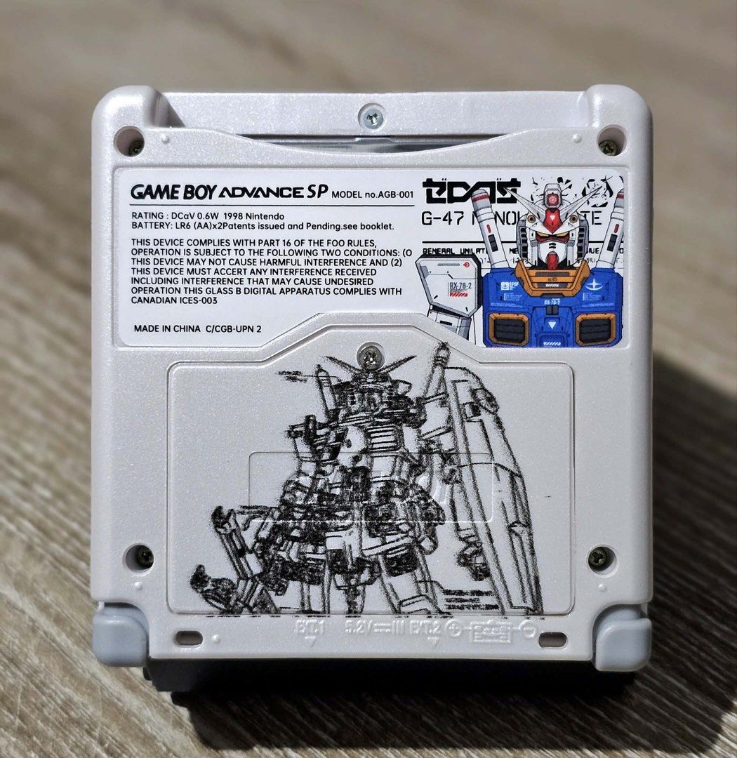 Gameboy Advance SP AGS-101 (Category: Nintendo) located in Santa Rosa. Submitted by j.r.constantino (Listing ID 1460086172, Image 3). Description: 📣 For sale Gameboy Advance SP 📣 🏷️ ₱5,000 ➡️ AGS-101 model ➡️ Bright screen (has some hairline scratches on the plastic lens, not the LCD) ➡️ New Gundam shell ➡️ Loud sounds (newly replaced capacitor) ➡️ All buttons are crisp and working ➡️ EXT and charging port are working ➡️ With new battery and c