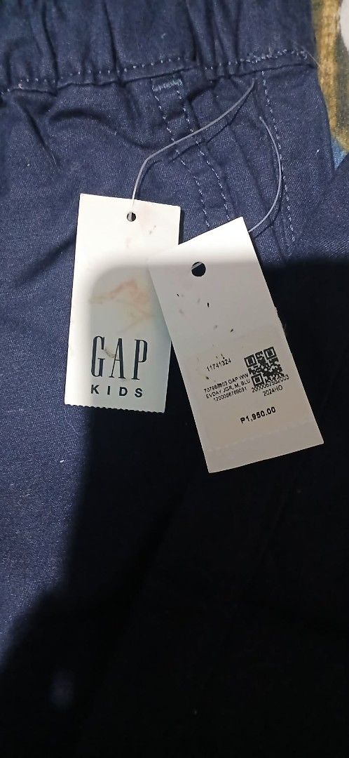 GAP Kids Navy Blue Casual Pants (Category: Babies & Kids Fashion) located in Cavite. Submitted by crispeleno90843 (Listing ID 1459915754, Image 2). Description: - Brand: GAP Kids - Color: Navy Blue - Size: M (8) - Features: Elastic waistband with drawstring - Condition: Brand new with tags - Style: Casual, perfect for everyday wear - Origin: Made in Bangladesh.