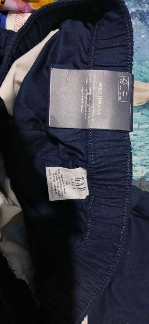 GAP Kids Navy Blue Casual Pants (Category: Babies & Kids Fashion) located in Cavite. Submitted by crispeleno90843 (Listing ID 1459915754, Image 3). Description: - Brand: GAP Kids - Color: Navy Blue - Size: M (8) - Features: Elastic waistband with drawstring - Condition: Brand new with tags - Style: Casual, perfect for everyday wear - Origin: Made in Bangladesh.