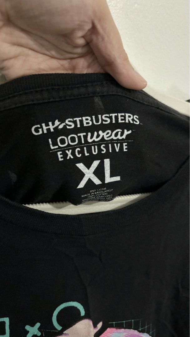 Ghostbusters Retro Neon Logo Graphic Tee (Category: Shirts) located in Caloocan City. Submitted by buymethisandthat (Listing ID 1460003349, Image 3). Description: ✨ Black Ghostbusters Retro Neon Logo Graphic Tee - ₱129 📌 CONDITION • Condition: 8/10 • Flaws: Minor cracked prints, collar stretch/wear 📏 SIZE • Tag Size: Extra Large • Recommended Fit: Fits Medium (oversized tee) to Extra Large .