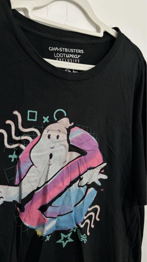 Ghostbusters Retro Neon Logo Graphic Tee (Category: Shirts) located in Caloocan City. Submitted by buymethisandthat (Listing ID 1460003349, Image 2). Description: ✨ Black Ghostbusters Retro Neon Logo Graphic Tee - ₱129 📌 CONDITION • Condition: 8/10 • Flaws: Minor cracked prints, collar stretch/wear 📏 SIZE • Tag Size: Extra Large • Recommended Fit: Fits Medium (oversized tee) to Extra Large .