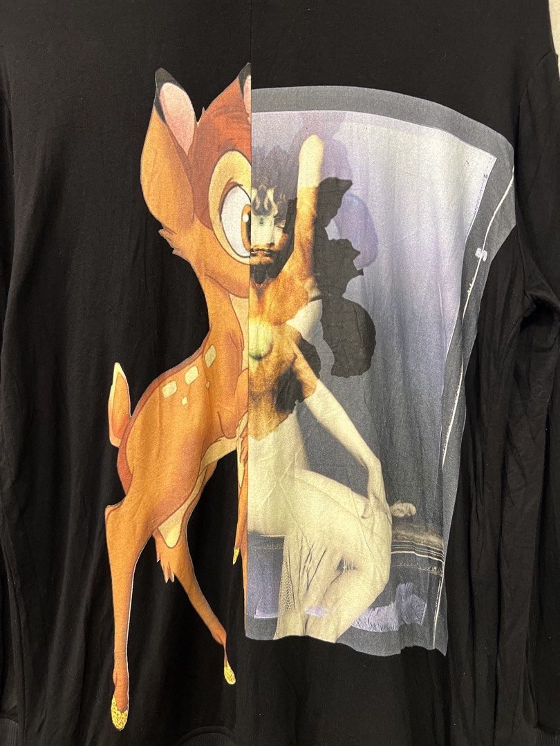 Givenchy Bambi Graphic Print Crewneck (Category: Longsleeves) located in Manila. Submitted by -handpick- (Listing ID 1459951640, Image 3). Description: This is a black Givenchy crewneck sweatshirt featuring an iconic split graphic of Bambi alongside a vintage portrait collage. Size : Small Dimensions : Length: 29 inches Width: 21 inches Shoulder : 19 inches Sleeve :23 inches Sign of wear in good condition .
