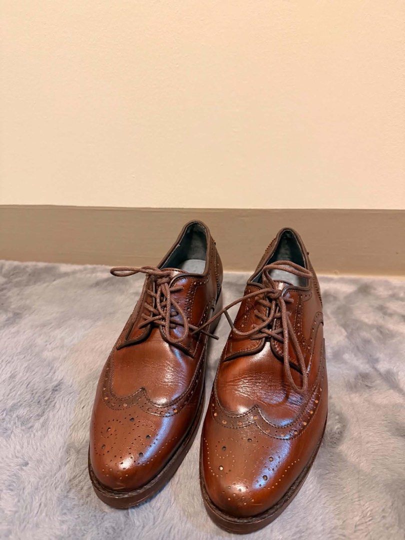 Godfather mid tan formal shoes (Category: Dress Shoes) located in Mandaluyong City. Submitted by danee. (Listing ID 1460028273, Image 3). Description: - handcrafted in marikina (godfather shoes) -Classic brown leather shoes - mid tan color - size 8 to 8.5 - Timeless design, versatile for any outfit - Comes with original box and pouch - only used twice - 2 inches heels - original price 12,000 .