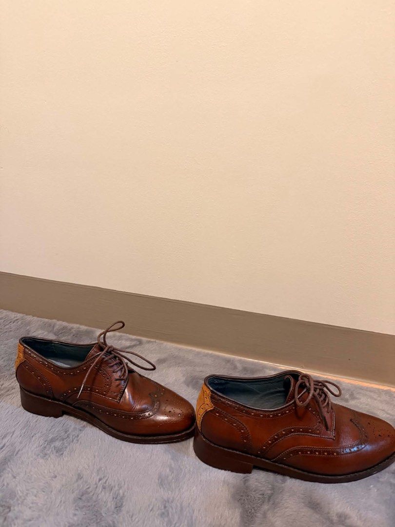 Godfather mid tan formal shoes (Category: Dress Shoes) located in Mandaluyong City. Submitted by danee. (Listing ID 1460028273, Image 2). Description: - handcrafted in marikina (godfather shoes) -Classic brown leather shoes - mid tan color - size 8 to 8.5 - Timeless design, versatile for any outfit - Comes with original box and pouch - only used twice - 2 inches heels - original price 12,000 .