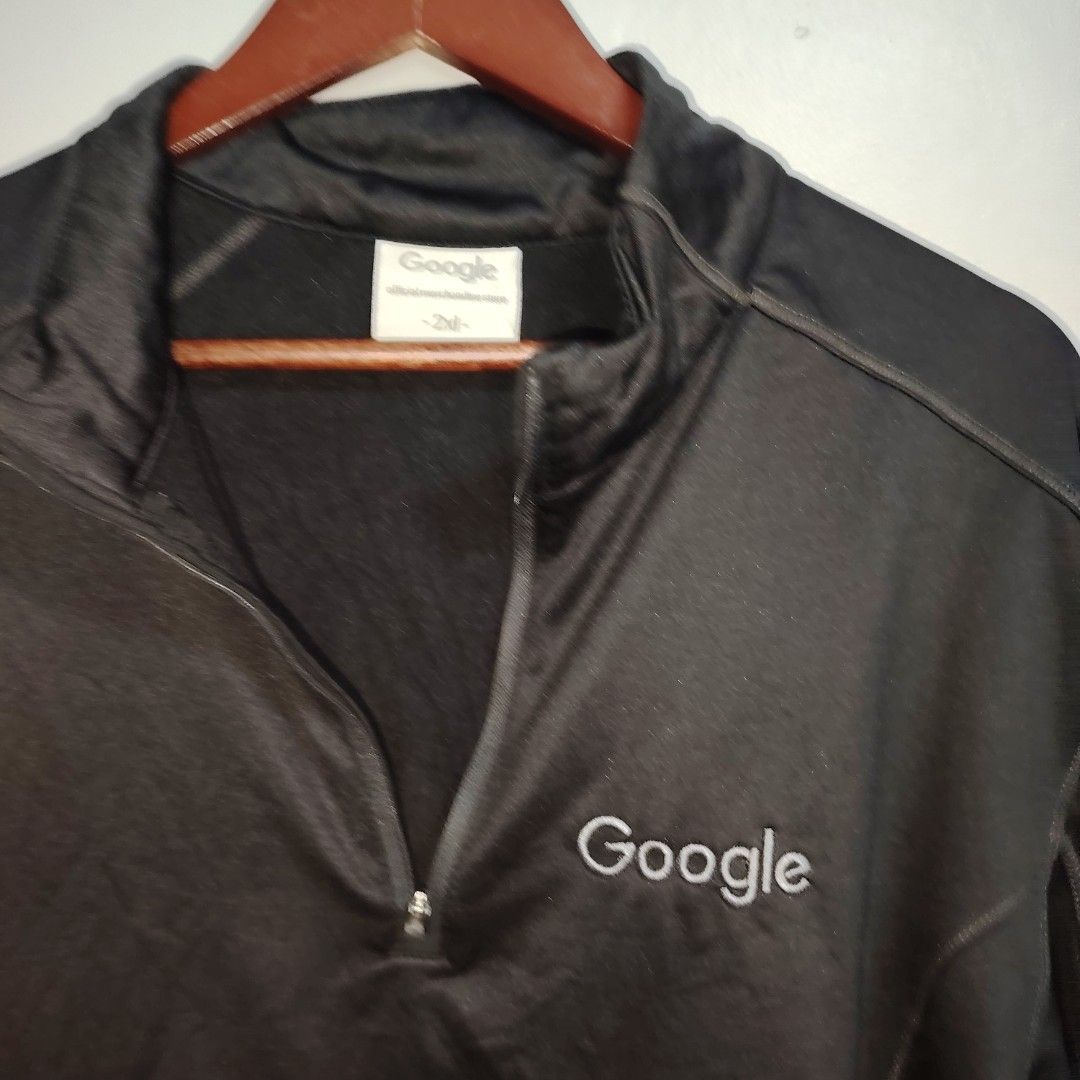 Google Black 1/4 Zip Long Sleeve Sweatshirt (Category: Coats, Jackets and Outerwear) located in Manila. Submitted by r.belamide (Listing ID 1460074149, Image 3). Description: - Black Google long sleeve sweatshirt - Features a 1/4 zip neckline - Embroidered Google logo on the chest - Made from a polyester and elastane blend - Ideal for casual outings or gym sessions.