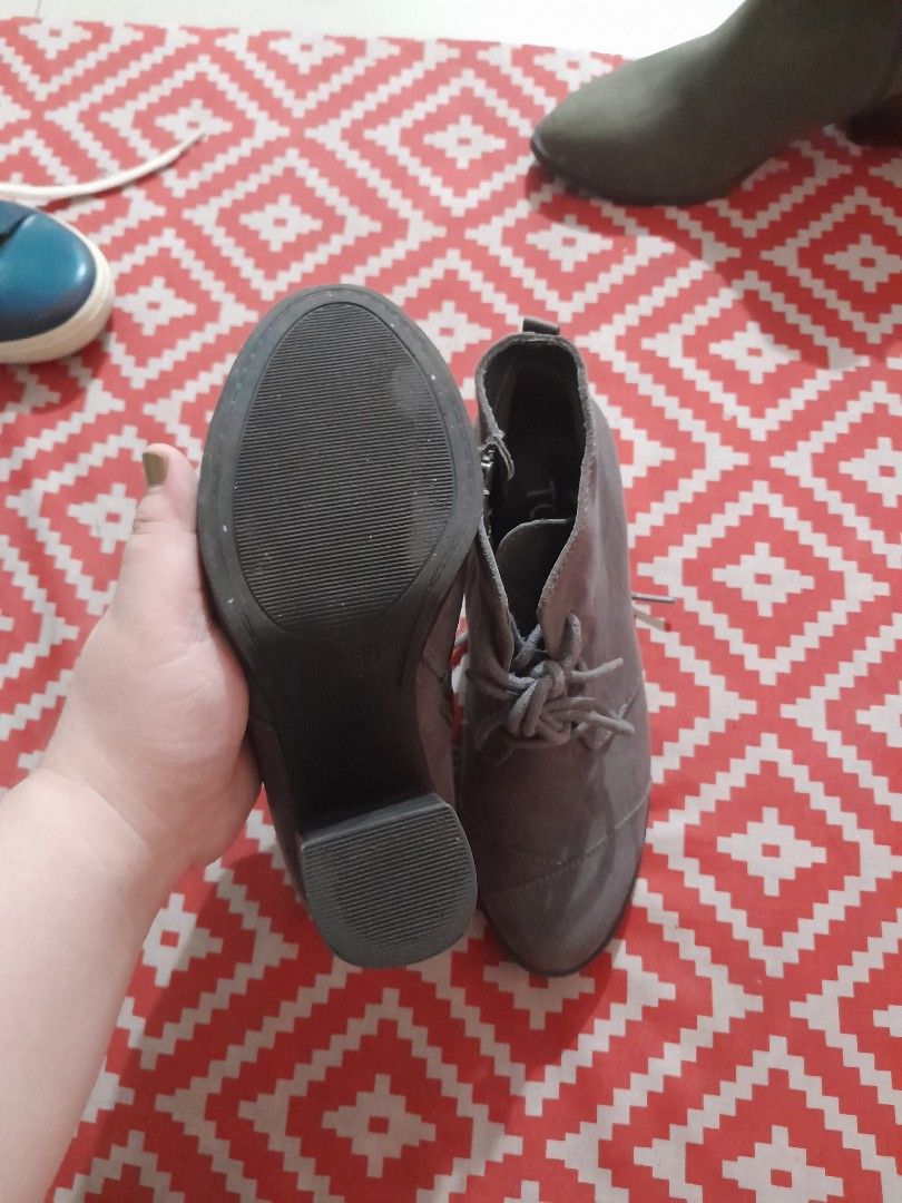 Grey Suede Lace-Up Block Heel Ankle Boots (Category: Boots) located in Manila. Submitted by joyhufalar (Listing ID 1459925366, Image 3). Description: - Grey suede ankle boots - Lace-up front and side zipper for easy wear - Chunky block heel for style and stability - Perfect for dressing up or down - Comfortable for walking all day - In good, pre-loved condition.