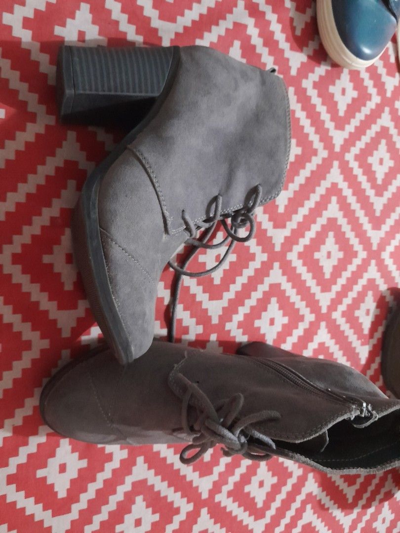 Grey Suede Lace-Up Block Heel Ankle Boots (Category: Boots) located in Manila. Submitted by joyhufalar (Listing ID 1459925366, Image 2). Description: - Grey suede ankle boots - Lace-up front and side zipper for easy wear - Chunky block heel for style and stability - Perfect for dressing up or down - Comfortable for walking all day - In good, pre-loved condition.