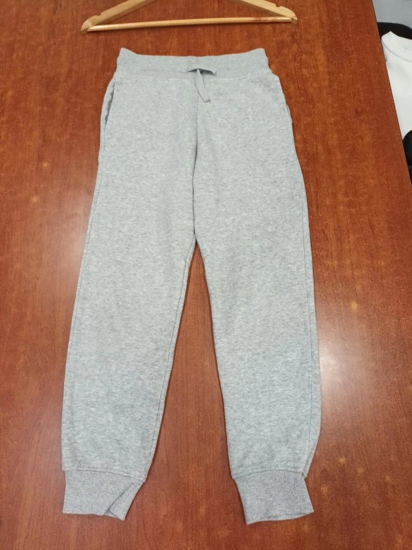 2 Grey Sweatpants Joggers (Category: Babies & Kids Fashion) located in Paranaque City. Submitted by rizatamayo (Listing ID 1459991493, Image 1). Description: - Comfortable grey sweatpants - Elastic waistband with drawstring - Cuffed ankles for a snug fit - Ideal for lounging or casual wear - Measurements available in photos - Looking for a new home! - 2 sets (Black and Gray Color) H&M brand.