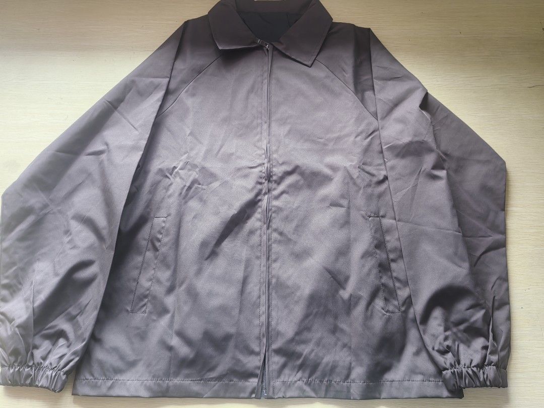 Grey Zip-Up Jacket (Category: Coats, Jackets and Outerwear) located in Quezon City. Submitted by brycine022416 (Listing ID 1460062585, Image 1). Description: - Grey zip-up jacket - Collared neckline with full zip closure - Two side pockets - Elasticated cuffs and hem - Ideal for layering - Measurements: Length approx. 26 inches, Pit to pit approx. 22 inches.