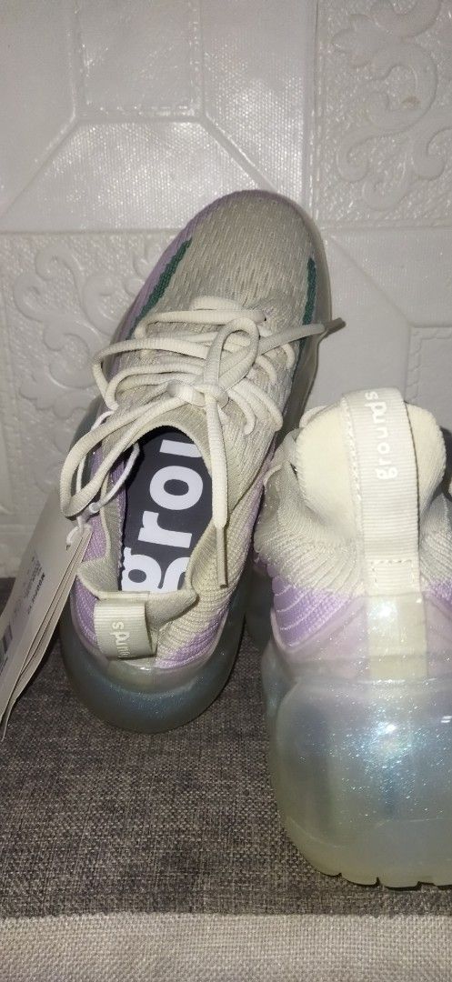 GROUNDS MOOPIE T2 Clear Bubble Sneakers (Category: Sneakers) located in Santa Cruz. Submitted by madonnaching (Listing ID 1460009347, Image 3). Description: - Grounds sneakers - Unique clear bubble sole with iridescent colors - Light cream knit upper with pastel purple and green accents - Super comfy and stylish - Comes with original tags.