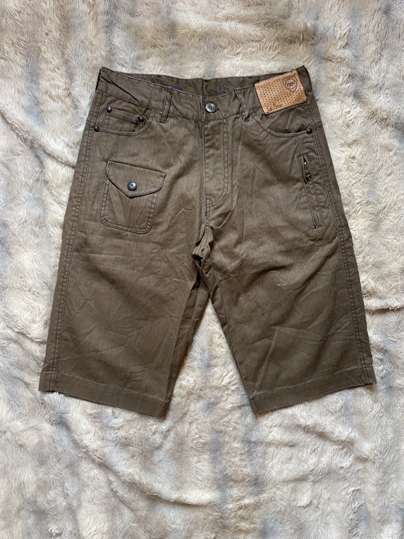 G-Star Raw Men's Brown Cargo Shorts (Category: Shorts) located in Andop. Submitted by safewater-895a (Listing ID 1459902011, Image 1). Description: - Brand: G-Star Raw - Color: Brown - Style: Cargo shorts - Closure: Button and zip fly - Pockets: Multiple, including a side zippered pocket - Features: Belt loops, adjustable buckle at back waistband - Occasion: Casual wear - Waistline: 30-31 - Lenght: 23.