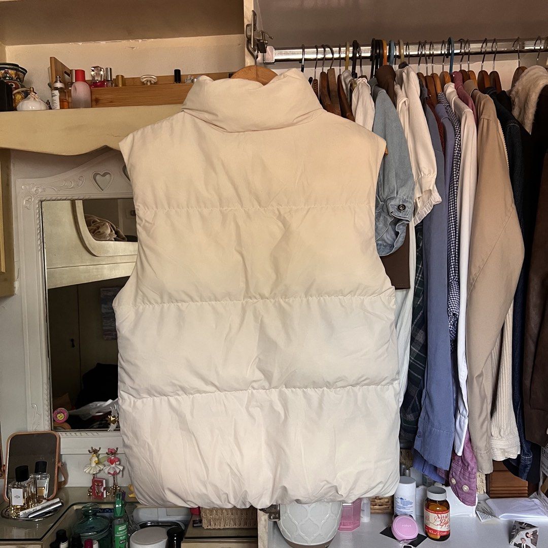 GU Puffer Vest Cream (Category: Coats, Jackets and Outerwear) located in Quezon City. Submitted by trishqry (Listing ID 1459975024, Image 3). Description: - Cream colored puffer vest from GU - Sleeveless design with high collar - Zip closure and two front pockets - Size XS.