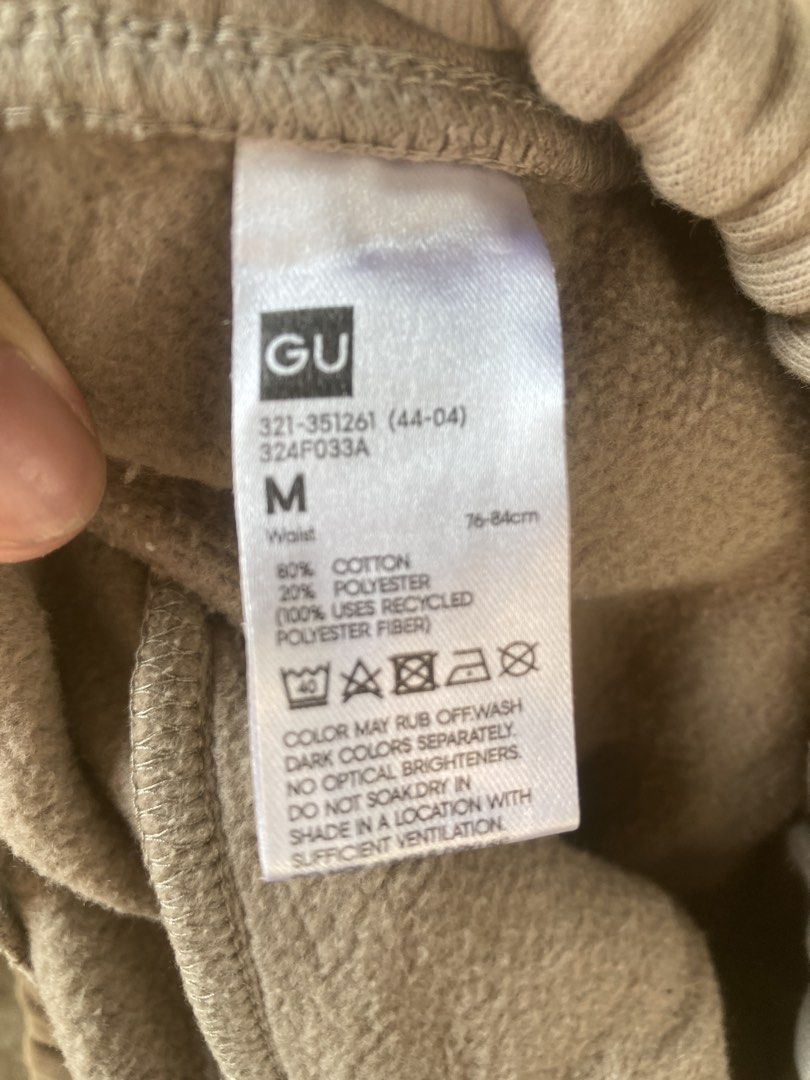 GU Sweatpants M Beige Cotton Polyester Joggers (Category: Joggers) located in Tacloban City. Submitted by sid1999 (Listing ID 1459977856, Image 2). Description: - Comfortable beige sweatpants from GU - Made with a cotton and recycled polyester blend - Features an elastic waistband with drawstring - Includes two side pockets and one back pocket - Cuffed ankles for a snug fit - Ideal for lounging or casual wear fits 28-32.