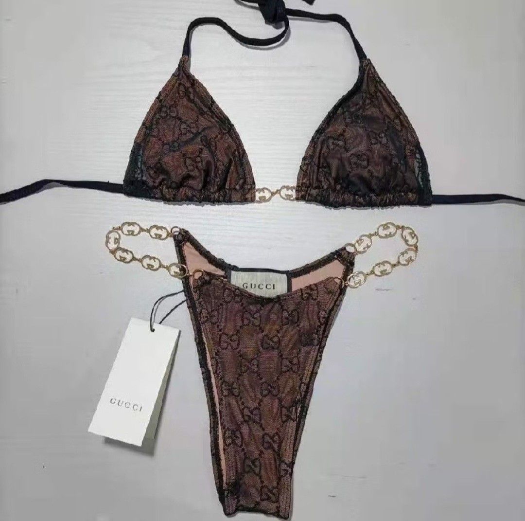 Gucci Lace Monogram Bikini Set No Pads (Category: Bikinis & Swimsuits) located in Batangas. Submitted by thriftshop_izy15 (Listing ID 1459996632, Image 3). Description: - Gucci sexy black lace bikini set - Triangle top with adjustable straps - Matching with 30 " waistline thong bottom - Delicate chain detail along the waistline - Ideal for beach vacations and pool parties - Comfortable and stylish design.