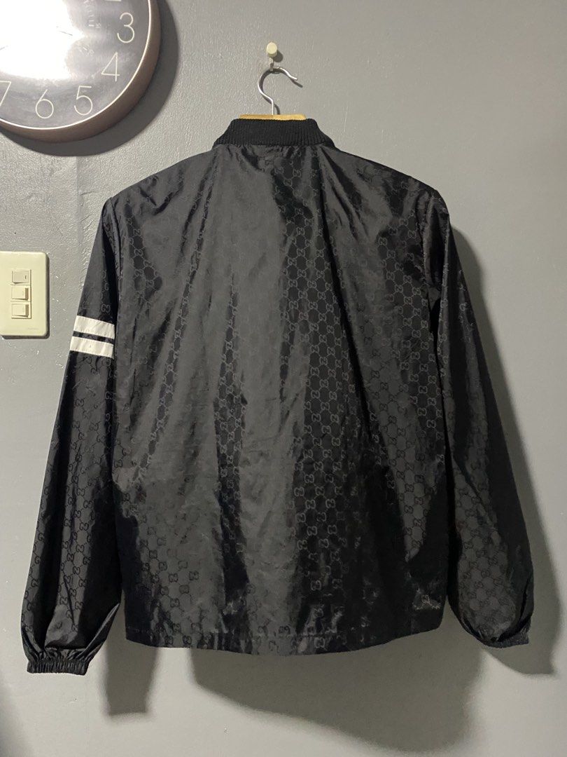 Gucci Monogram Track Jacket Black (Category: Luxury Apparel) located in Tanay. Submitted by judevalcorza (Listing ID 1460098830, Image 2). Description: - Gucci track jacket - All-over GG monogram pattern - White stripe detail on sleeves - Zip-up front with two zip pockets - Ribbed collar and cuffs - Size: Small - Measurements: Length 25", Width 21" - Excellent Missing Maintag - 1850 Fix From 2500 - Shipping Is Shoulder of the Buyer.