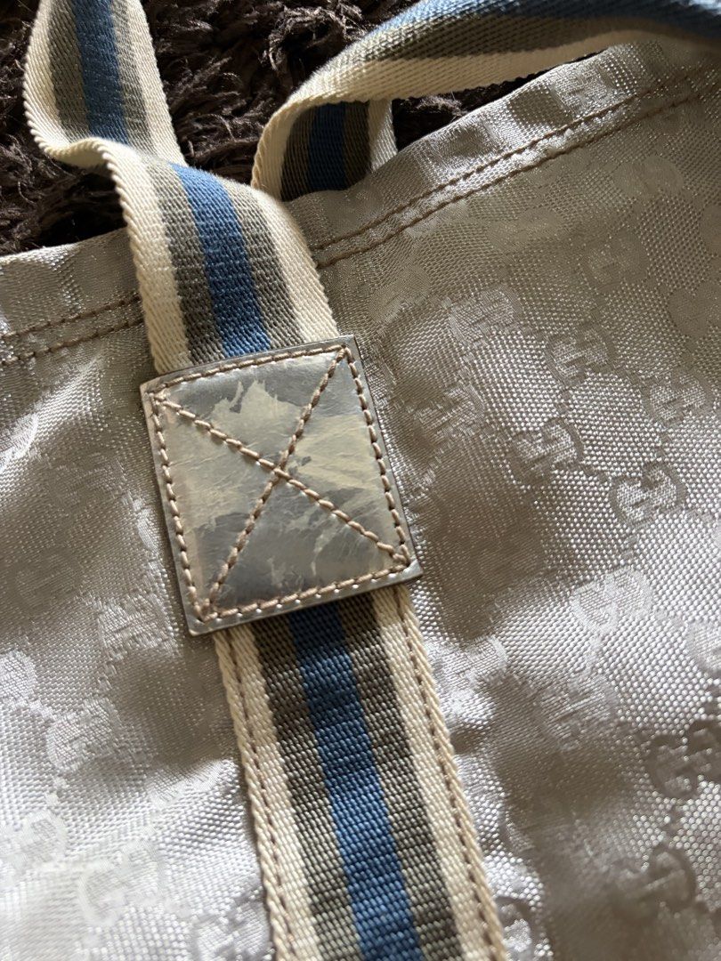 Gucci Vintage Silver GG Monogram Tote Canvas Web (Category: Luxury Bags & Wallets) located in Antipolo. Submitted by pinkktopaz (Listing ID 1459989460, Image 3). Description: Well used with stains/discoloration near top handle Guaranteed authentic As is.