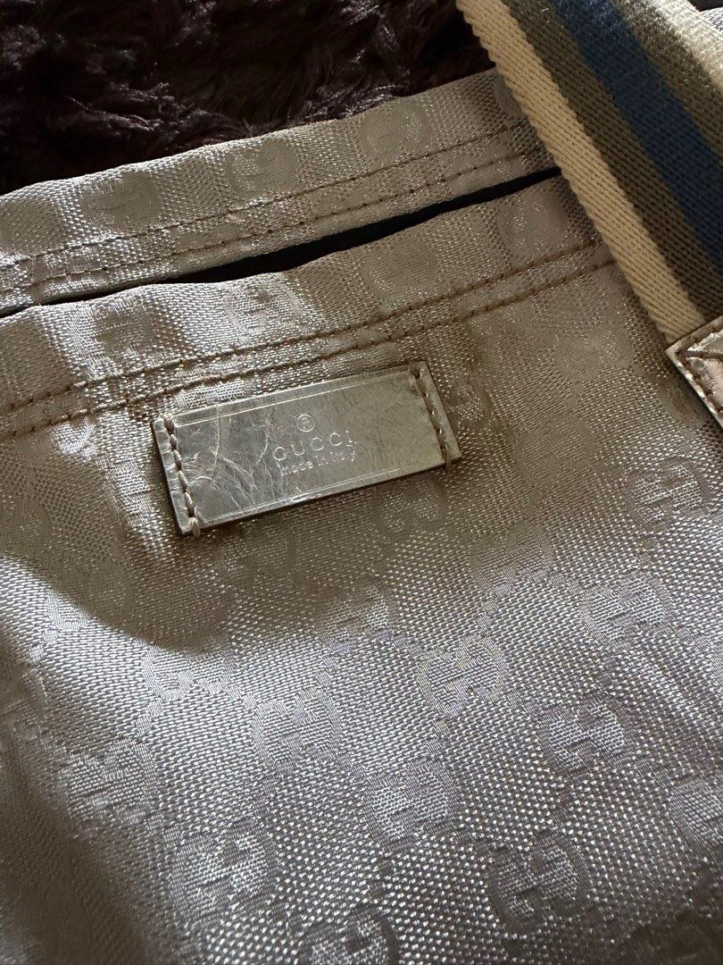 Gucci Vintage Silver GG Monogram Tote Canvas Web (Category: Luxury Bags & Wallets) located in Antipolo. Submitted by pinkktopaz (Listing ID 1459989460, Image 2). Description: Well used with stains/discoloration near top handle Guaranteed authentic As is.