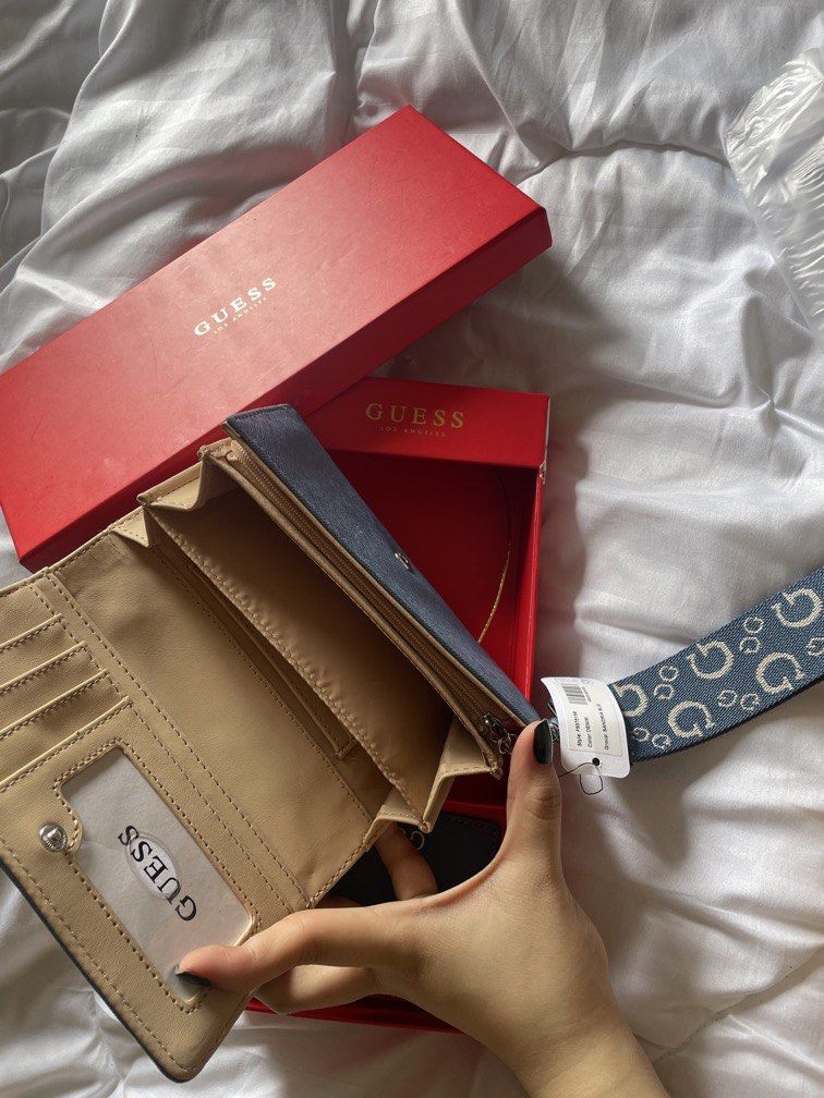 Guess gift set blue long wallet card wallet (Category: Wallets & Card holders) located in Dinalupihan. Submitted by closetbymint (Listing ID 1459924673, Image 2). Description: .